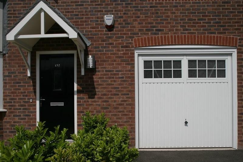 MATERIALS TO CONSIDER WHEN BUYING A NEW GARAGE DOOR